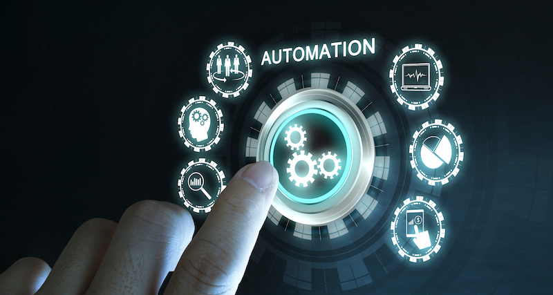 Finger touching a screen with automation written and various icons.