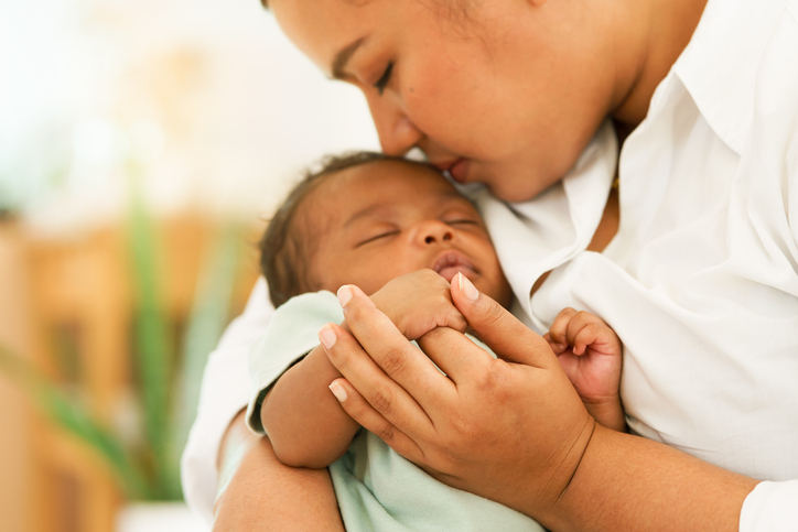 Newborn baby and mother